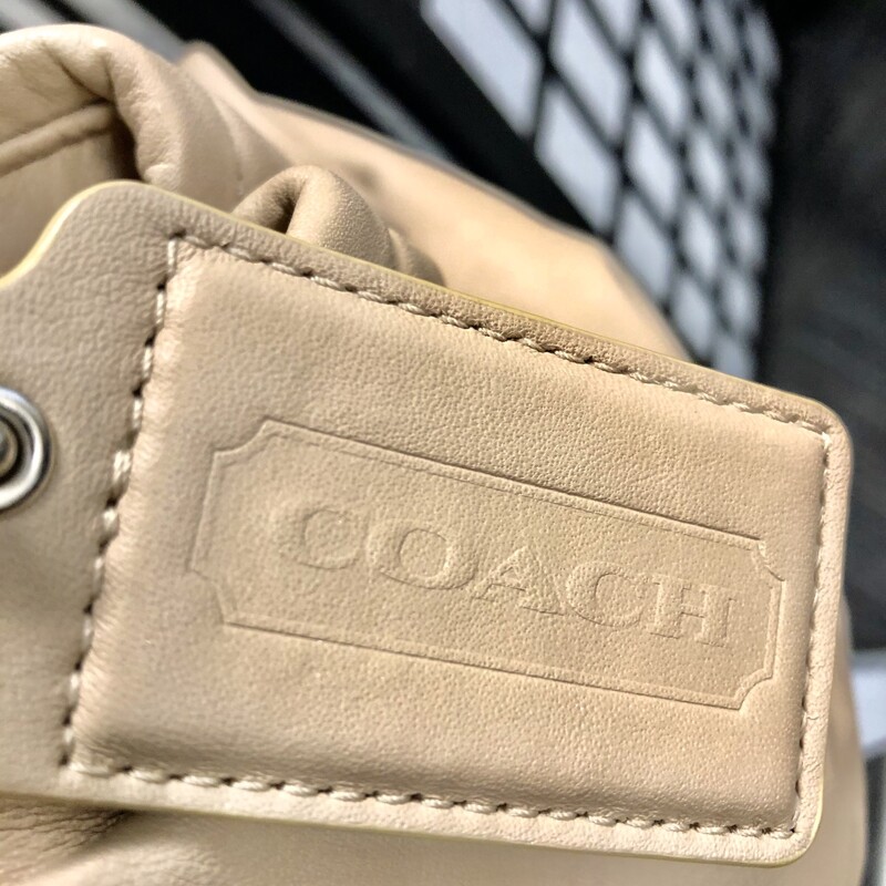 . Coach medium sized leather purse.  Dimensions are approximatelyn 15\" X 8\".  Slight imperfections , gently used yet good condition.  Please refer to photos.  Unique style to Coach!!