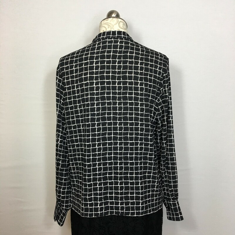 100-284 No Tags, Black, Size: Large Long sleeve black blouse w/ white pattern