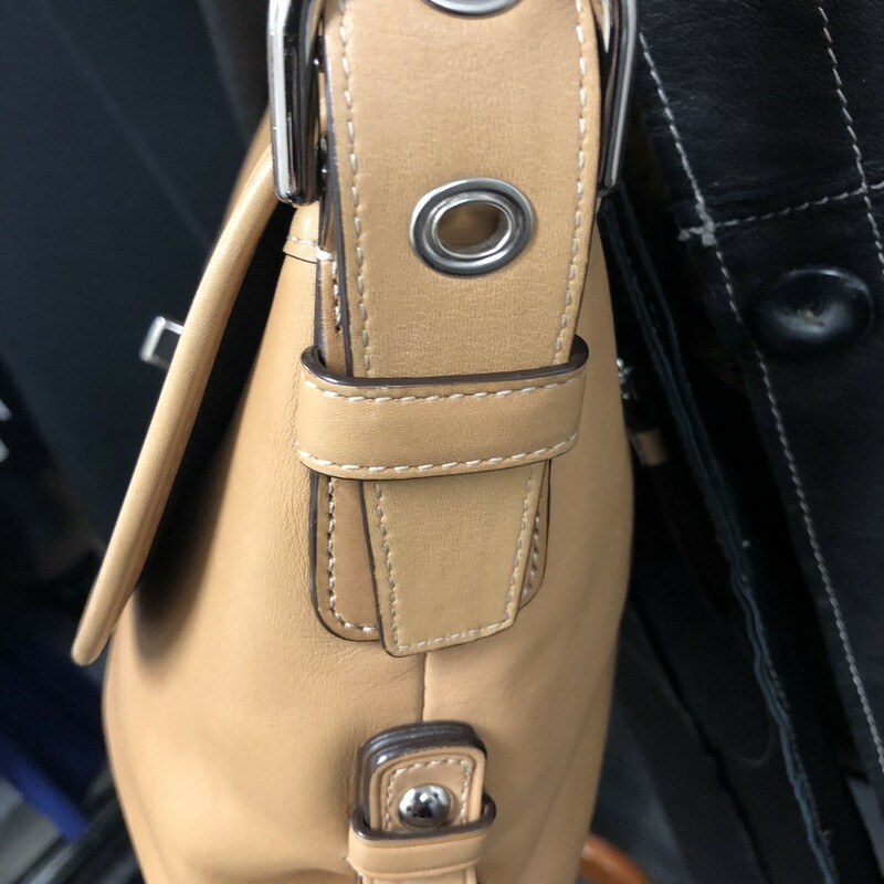 COACH  camel leather  bag.  Wow!! This measures approximately 13\" X 8\".   This can be used as either a classic shoulderbag as well a a crossbody bag due to the fact that strap which is adjustable.  This has a front flap with closure, simple  and sharp silver hardware accents, zippered pocket located in back of bag as well as 1 large zippered side pocket inside and 2 handy open pockets on other side.  Please refer to pictures.  Again a true classic, unique and smart.
