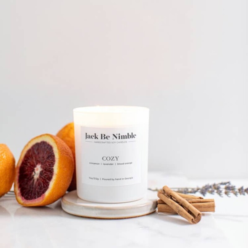 A warming blend of cinnamon, lavender, and blood orange that evokes nostalgia and cozy comfort.<br />
<br />
DETAILS<br />
<br />
-Scent notes: cinnamon • lavender • blood orange<br />
- Features a dual wick and smoked wood lid<br />
- 11 oz candle burns clean for 60-65 hours<br />
- Packaged in a matte white gift box<br />
- Poured by hand in Georgia