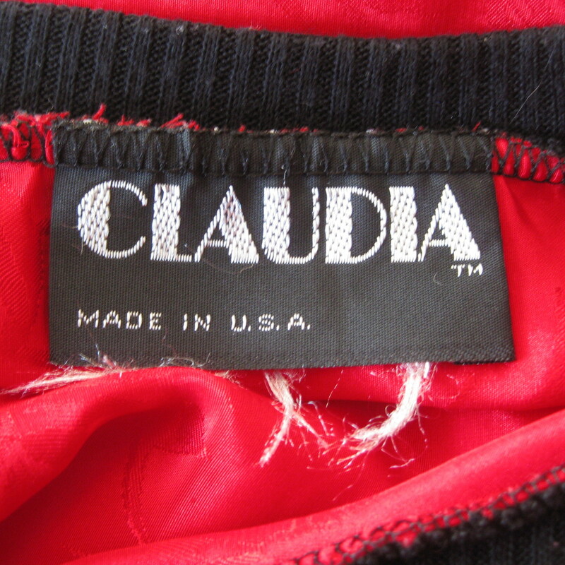 Bright red shirt from the 1980s in satin jacquard

Black contrast trim at neck and sleeve ends

Made in the USA by the brand Claudia
Marked size large
flat measurements:
armpit to armpit: 24in
length: 24 3/4in

excellent condition, no flaws

thanks for looking!