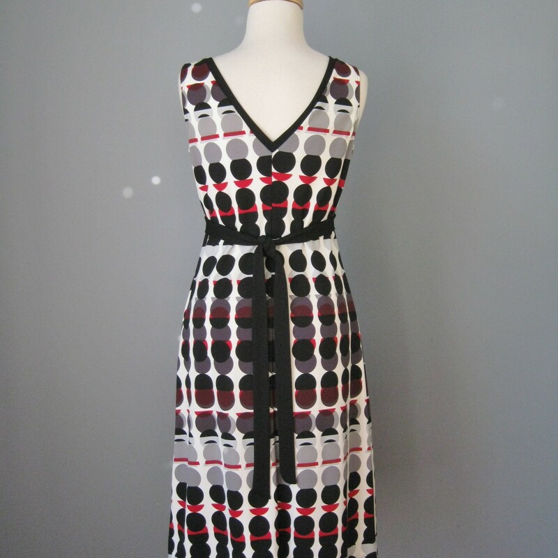 Super easy peezy knit dress for work, church , afternoon events.<br />
V neck and Back<br />
Slip on<br />
Red Black and White Print<br />
100% polyester<br />
size 4<br />
<br />
Perfect condition<br />
A-A: 16 3/4in<br />
L: 39 1/2in<br />
Thanks for looking!
