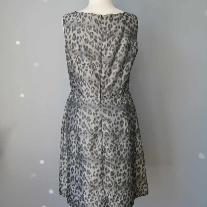 Pretty sleeveless sheath dress with relaxed fit from the waist down.<br />
Jeweled waist detail<br />
Fully line<br />
Soft Animal print in gray<br />
Size 6<br />
<br />
perfect condition.<br />
Armpit to armpit: 18in<br />
waist: 14 3/4in<br />
hip: 22in<br />
length: 34in<br />
<br />
Polyester<br />
<br />
thanks for looking!