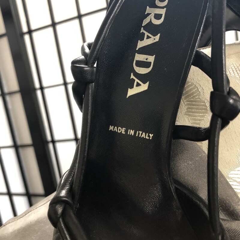 PRADA Sling Back Heels, Black, Size: 36 (6).  They have a kitten height heel of2\",straps on sides of heels have stylish leahter knots.  Frontal portion is closed and pointed ,  back strapped portion are slightly elasticized for comfort.  Prada pumps typically run a 1/2 size smaller..  Condition is very good and very very slight creasing at  front.  A welcome EASY AND COMFORTABLE accessory for any style of your choice!
