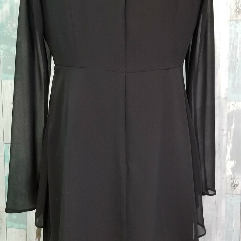 NEW Evan Picone formal. This dress is all one piece, fully lined with sheer sleeves and a cute rhinestone adornment.
 Black
Size: 12