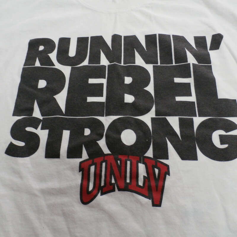 UNLV Rebels \"Running Rebel Strong\" Gildan Adult Shirt Size Large White #23905
Rating: (see below) 3 - Good Condition
Team: UNLV Rebels
Player: n/a
Brand: Gildan
Size: Adult Large - (Measured Flat: chest 20\", length 30\")
Color: White
Style: short sleeve; screen pressed
Material: 100% Cotton
Condition: 3 - Good Condition - wrinkled; material is stained blue throughout; pilling and fuzz; material feels coarse; material is lightly stretched; definite signs of use; no rips or holes
Item #: 23905
Shipping: FREE