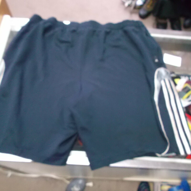 Adidas men's athletic shorts blue size large polyester # 7464
Rating (see below): 5 - Poor Condition
Brand: adidas
Size: Large- men's (Measured Flat: waist: 17\"; Length: 21\"inseam 8\") across waist laying flat & waist to bottom of leg opening
Color: Blue
Style: basketball shorts; drawstring and elastic waist; 2 front pockets
Material: 100 polyester 
Condition: Poor Condition - wrinkled; Material is faded and discolored; noticeable staining throughout; material and waistline are stretched out; logo is stained up; minor snags throughout; large stain near the left pocket; tiny yellow and red mark near left pocket; stains near the bottom edges of leg openings; definite signs of use (See Our Photos for detail)
Item #: 7464
Shipping: $4.20