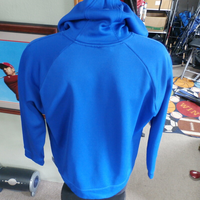 Title: Under Armour Men's Hoodie Blue Size Large #24190
Our Clothes Rating: 3- Good Condition
Brand: Under Armour
size: men's Large- (Chest: 24\" Length: 27\")
color: Blue
Style: Hoodie; 100% polyester; screen pressed; drawstrings; front pouch pocket; STORM
Condition: 3- Good- overall good condition; wrinkled; slightly stretched out from washing and use; a small burn hole top center front; pilling and fuzz; some light staining on the front lower and sleeve ends
Shipping: FREE
Item #: 24190