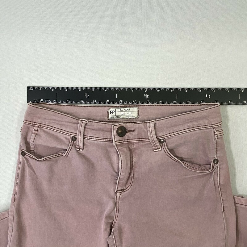 100-804 Free People, Pink, Size: 27 pink jeans with rips 53% cotton 23% rayon 22% polyester 2% spandex  good