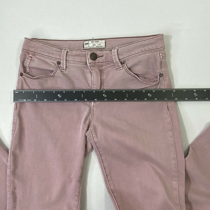 100-804 Free People, Pink, Size: 27 pink jeans with rips 53% cotton 23% rayon 22% polyester 2% spandex  good