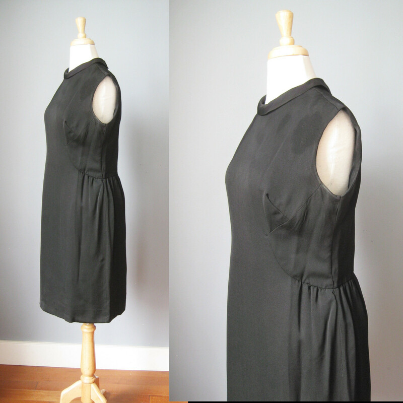 Super simple and timeless little black dress from the 60s<br />
Beautifully made<br />
sleeveless<br />
flat measurements:<br />
armpit to armpit: 20in<br />
waist: 17inin<br />
hip:21 1/4in<br />
length: 39in<br />
excellent vintage condition.<br />
<br />
thanks for looking!<br />
#9413