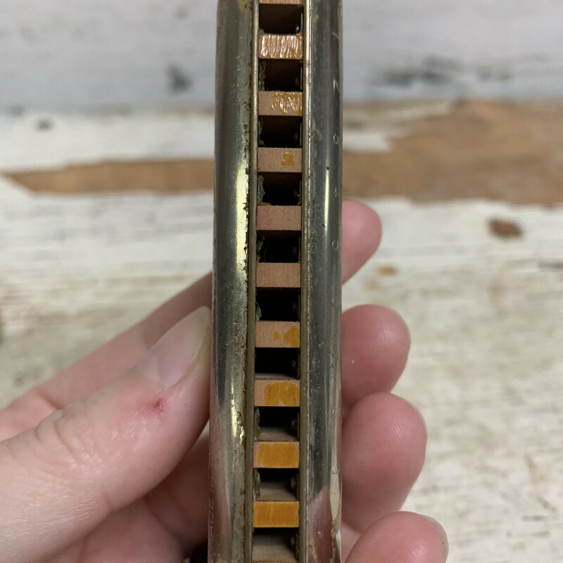 Comes with original box, box is in fair condition, have lots of tiers. Please make sure to look at all the pictures for a closer visual. Measures approx 4 1/4''  x 1 1/4'' x 1''<br />
<br />
Harmonica have some visual, rust, scratches, some dirt inside in it. I have never played harmonicas, but it does make a sound. Measures approx 4'' x 1'' x 3/4''  x<br />
<br />
Please note that this item is vintage and you will experience vintage wear.<br />
<br />
Thank you.