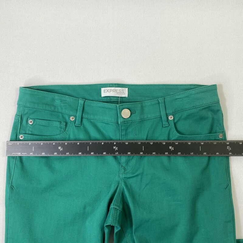 105-110 Express, Green, Size: 10 bright green skinny jeans 97% cotton 3% spandex  Good Condition