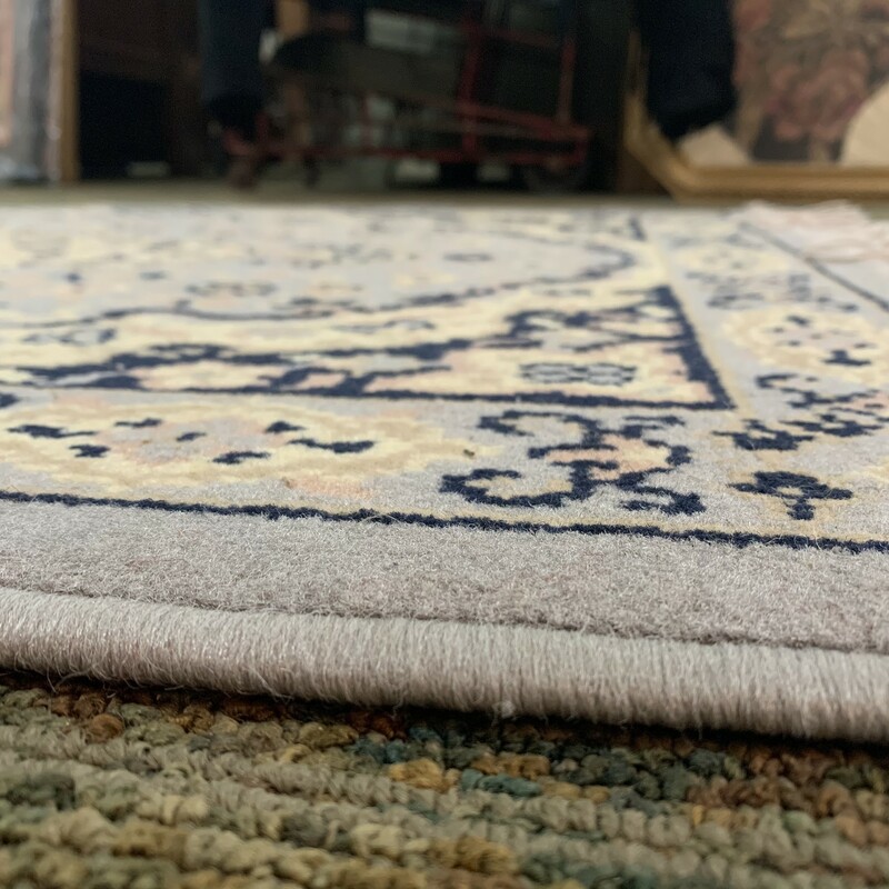 Vintage small area rug, measures 49'' x 31'' fringe measures 3'' long.<br />
Please note that this item is vintage and you will experience vintage wear. There is no holes. Needs some light cleaning.<br />
Thank you.