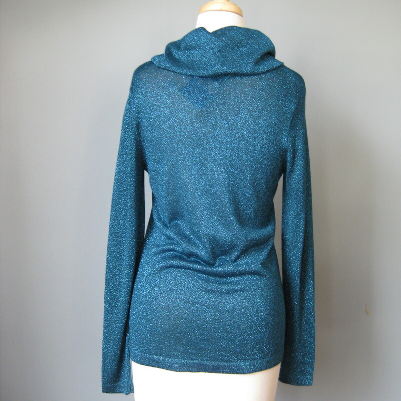 Coldwater Creek Glitter, Blue, Size: Small
wide, fold over funnel neck design with metallic glitter fabric. semi sheer