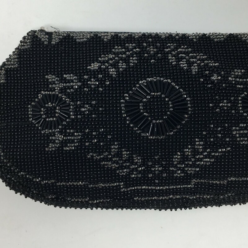 Black and grey beaded Vintage small change purse,This small purse with a back strap handle was made in CZECKOSLOVAKIA -There is a small square lipstick mirror that fits into its own interior pocket. The zipper still functional and interior clean.