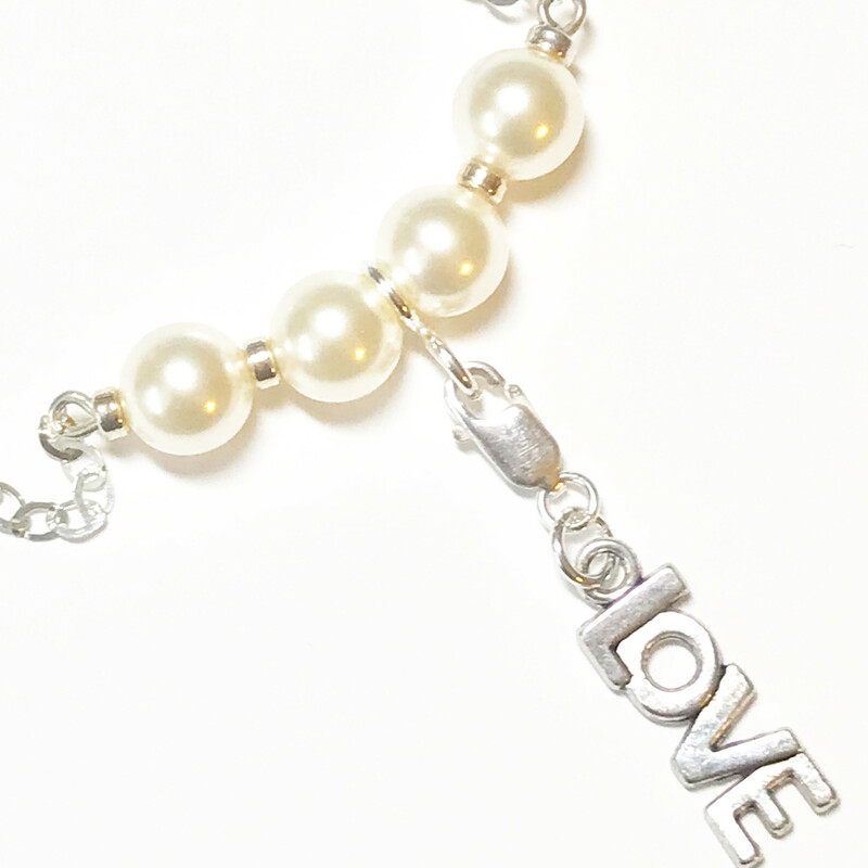 Karly Ne0016-c 16, Cream, Size: Necklace<br />
Sterling Silver Accessories-8mm. Swarovski Pearls-Charms Sets: Depending on Selected Set could be  Sterling Silver or Silver Plated-Chain Length: 16