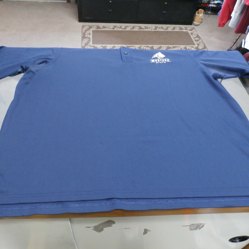 Montana Bobcats Under Armour Men's Polo Size XL Blue Polyester #25356<br />
Rating: (see below) 3 - Good Condition<br />
Team: Montana Bobcats<br />
Player: N/A<br />
Brand: Under armour<br />
Size: Men's - XL(Measured: Across chest 25\", length 28\")<br />
Measured: Armpit to armpit; shoulder to hem<br />
Color: Blue<br />
Style: Polo shirt; embroidered shirt; heatgear; loose fit<br />
Material: 100% Polyester<br />
Condition: 3 - Good Condition - wrinkled; material looks and feels good; sangs throughout; armpits have sweat stains; other few small stains; signs of use; no rips or holes<br />
Item #:  25356<br />
Shipping: FREE