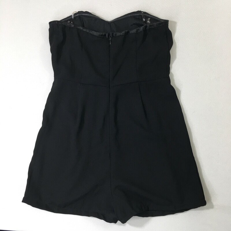 120-179 Mustard Seed, Black, Size: Medium Black  strapless romper, satin applique bodice, back hidden zipper closure, Elastic band with silicone gripper elastic and spaghetti silicone straps for support .   100% polyester<br />
6.3 oz