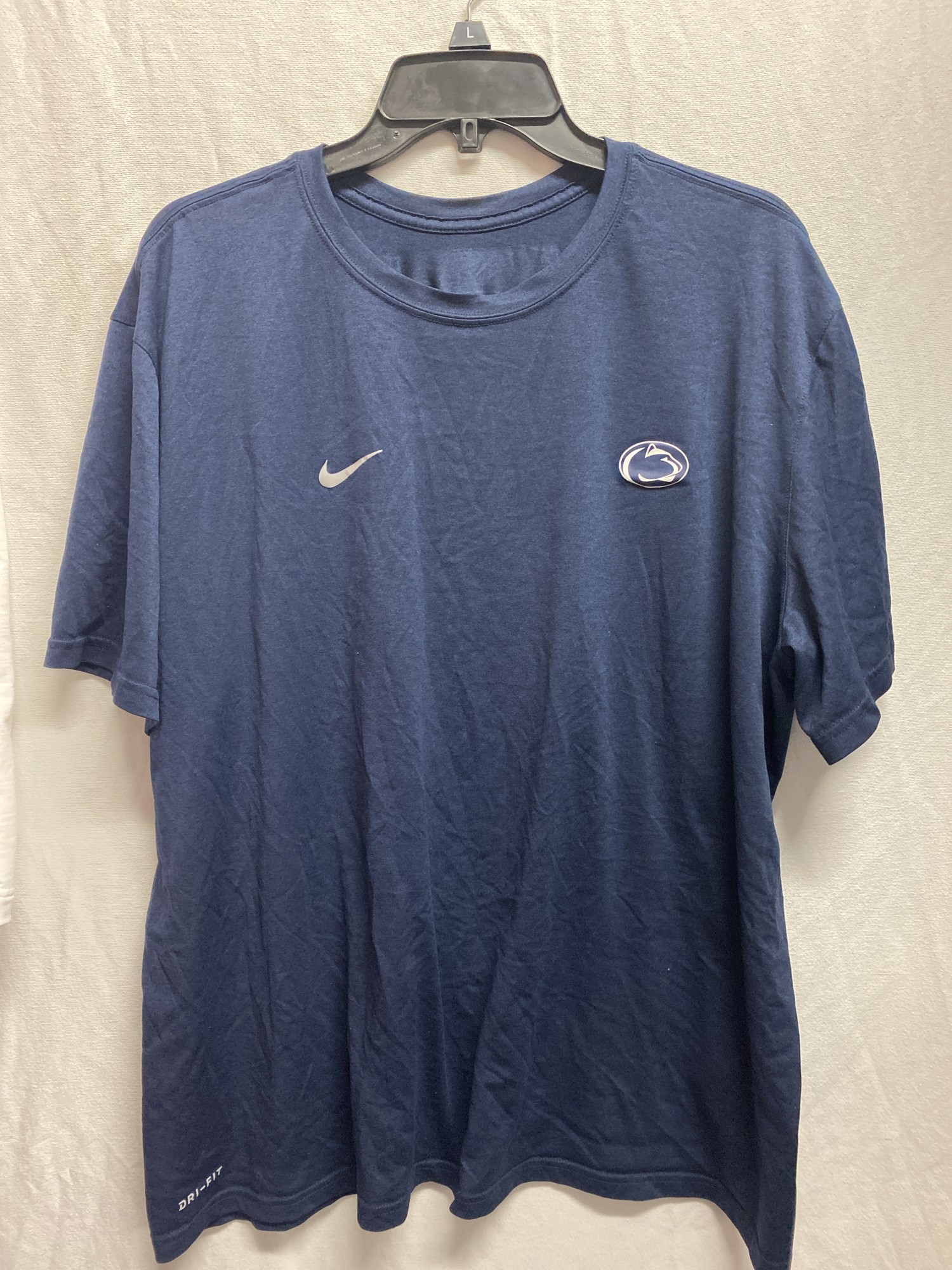 Used condition- wrinkled; faded; discoloring; previous player sticker at tag area was removed and left a mark
Blue- size 2XL