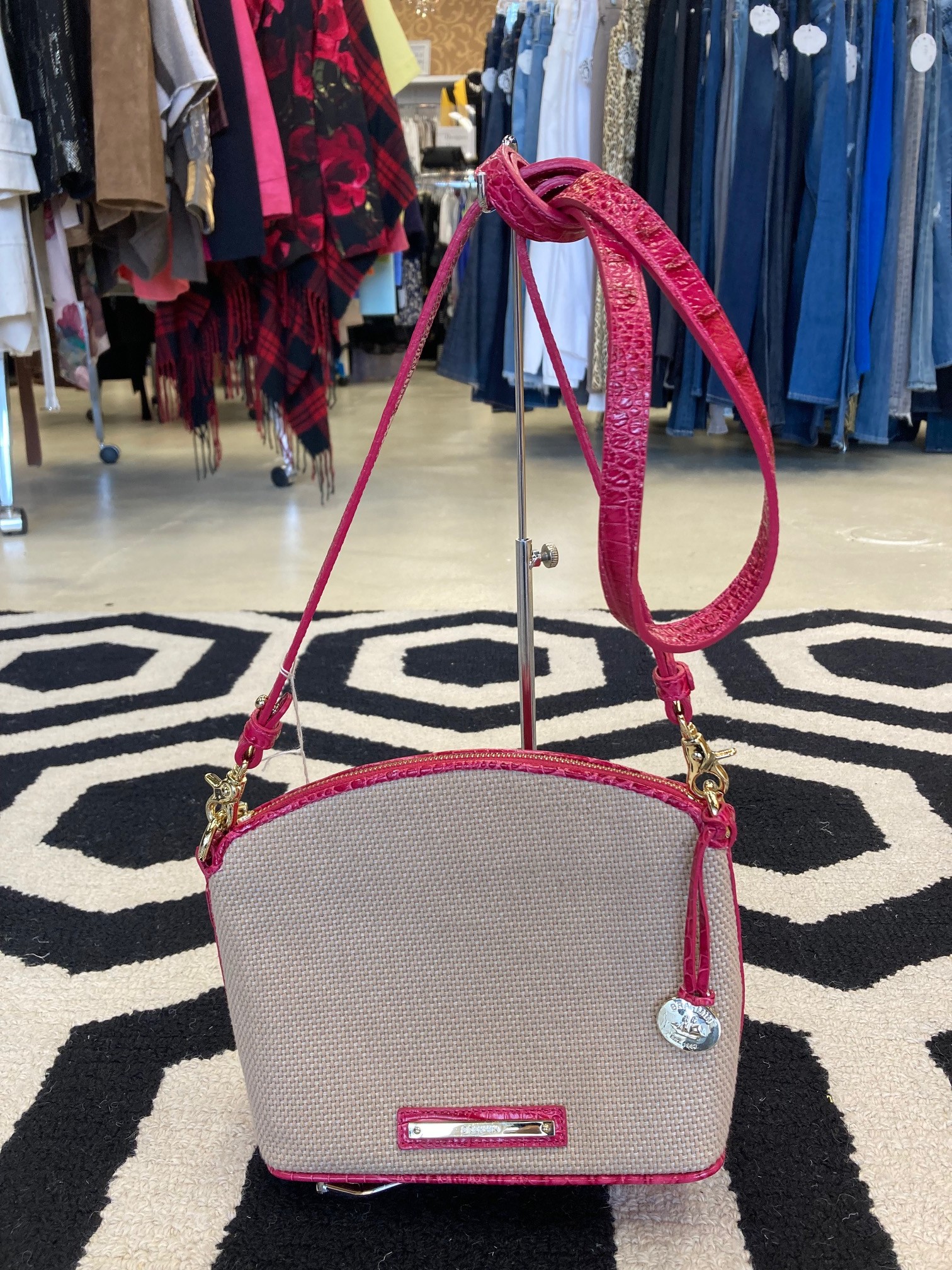 Brahmin Crossbody: This cute crossbody can come with you anywhere! Add a bit of pink and a lot of style to your outfit. Small size.  No signs of use.