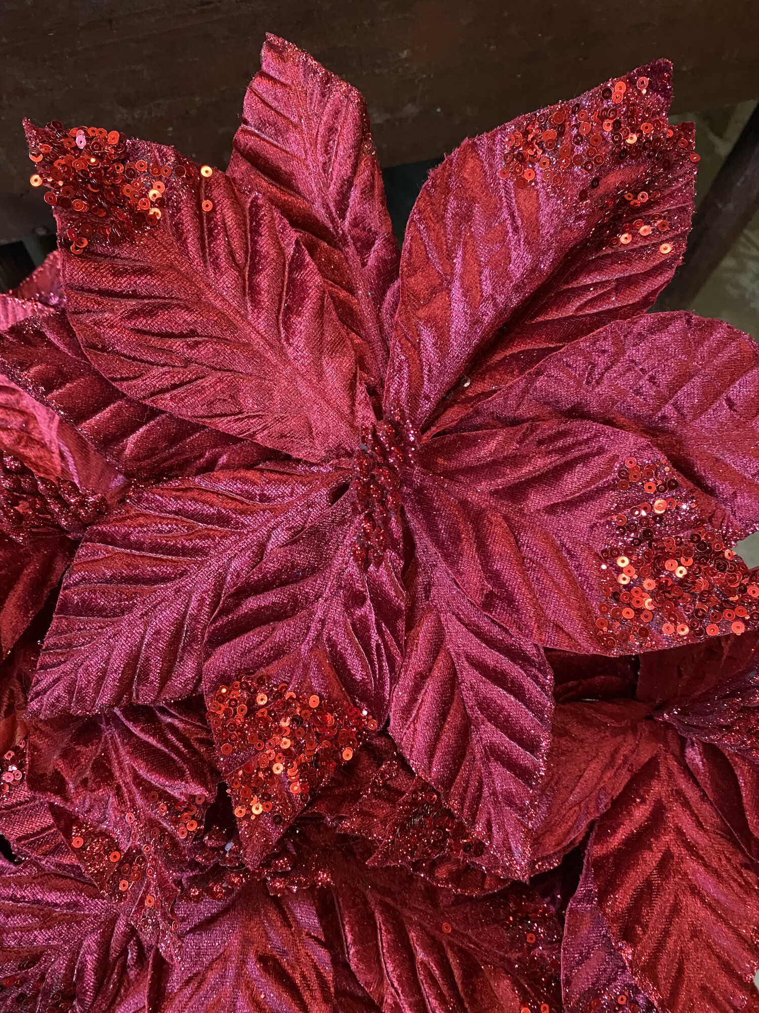 How beautiful are these red  velvet poinsettas with their touch of sparkle? They would be gorgeous placed inside your tree or on your christmas table in a vase. They measure 22 inches tall and  is 10 inches in diameter