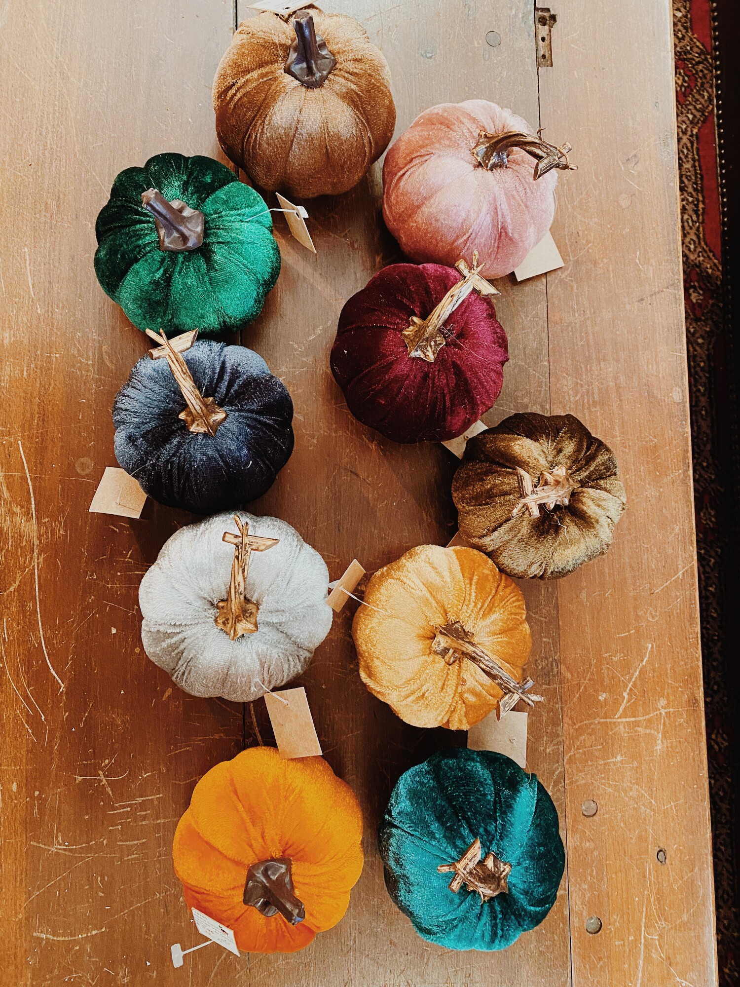 These velvet pumpkins measure 4 inches in diameter and are available in olive, blue, orange, silver, navy, gold, green, pink, brown, and burgundy!