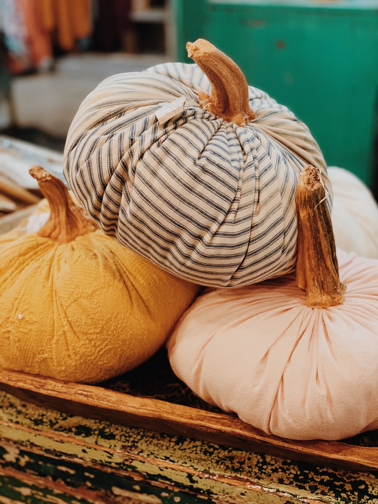 These handmade pumpkins measure about 11 inches in diameter and are made from vintage fabrics and have real pumpkin stems! They are available in Leopard 1, Leopard 2, Pink, Pink Chenille, Blue Ticking, Khaki, Yellow, and Cream.