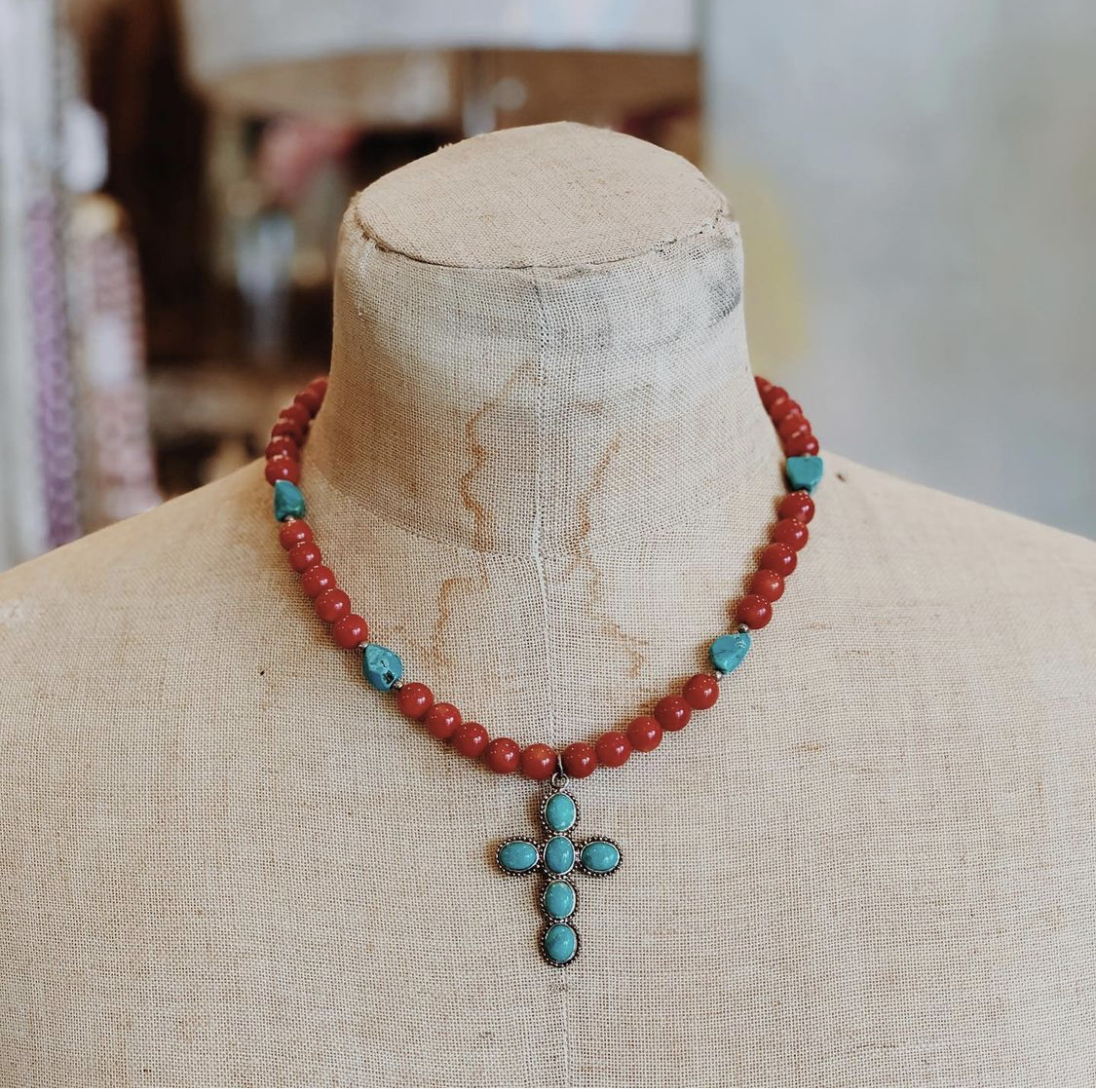 Such a fun piece with red and turquoise paired beautifully!
