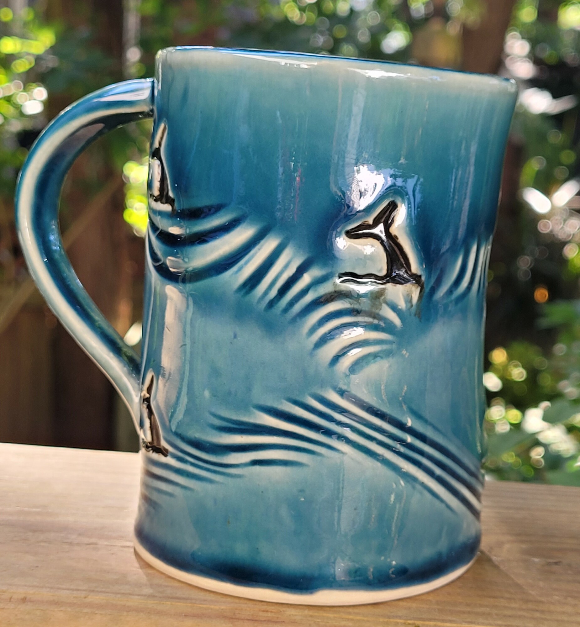Whale Mug
Artist:  Pam Gray
Ceramic handbuilt mug holds 12 oz.
This mug is microwave and dishwasher safe but hand washing recommended.
Price $32.00