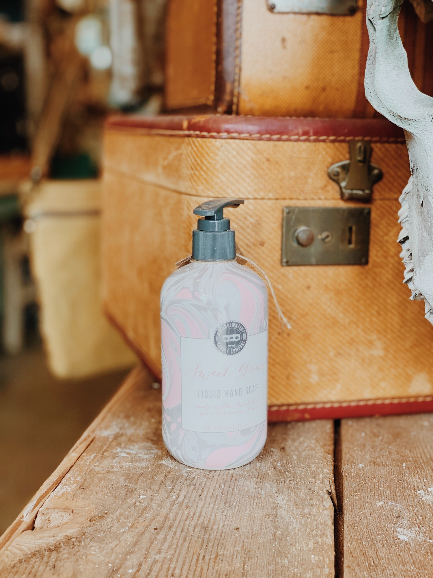 Our Bridgewater hand soap is a great, fragrant soap for your bathroom or kitchen! It comes in a 12 Fl Oz bottle and is made with shea butter for a luxurious clean!

Scent: Sweet Grace