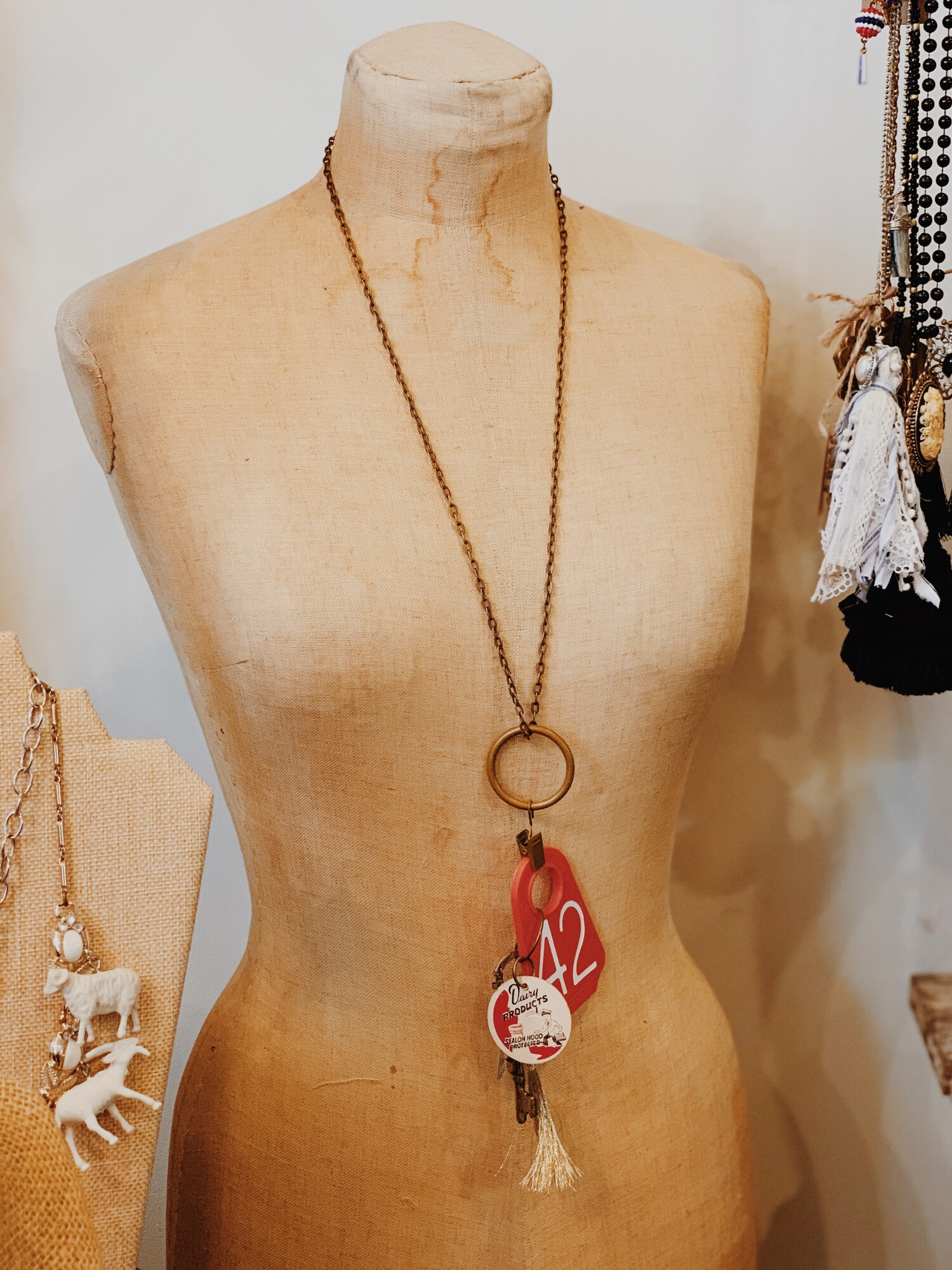 This one of a kind, handmade necklace is the perfect way to stand out! It measures 23.5 inches long total.