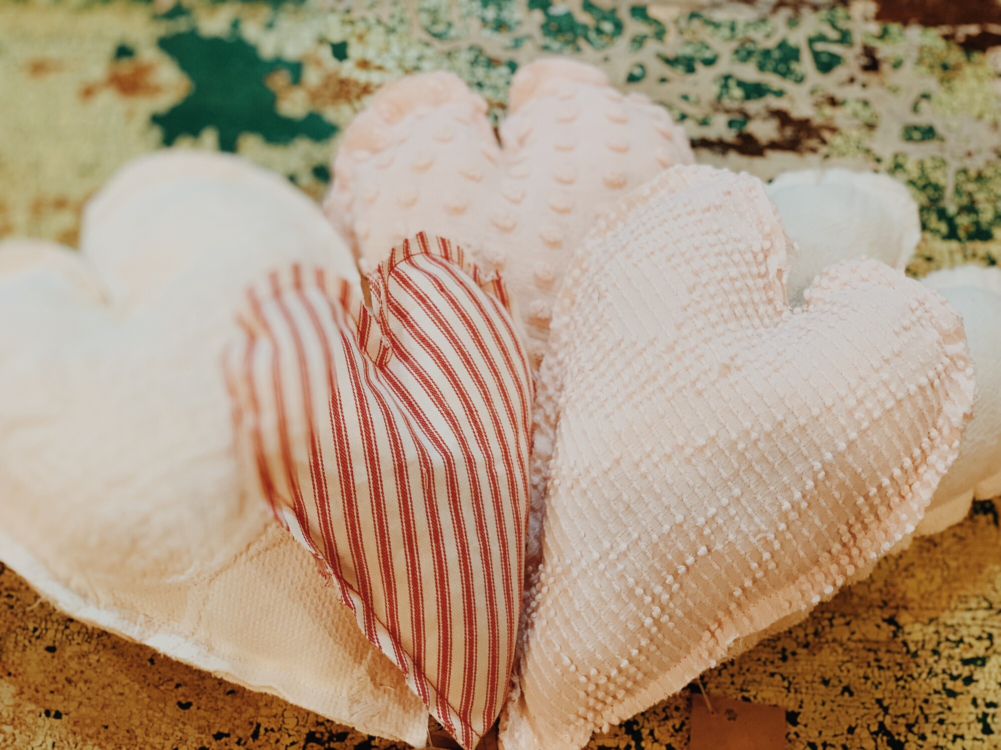 These adorable valentine hearts were handmade from vintage fabrics. They are available in Pink Chenille, White Chenille, White Muslin, Pink Popcorn, and Red Ticking Stripes.