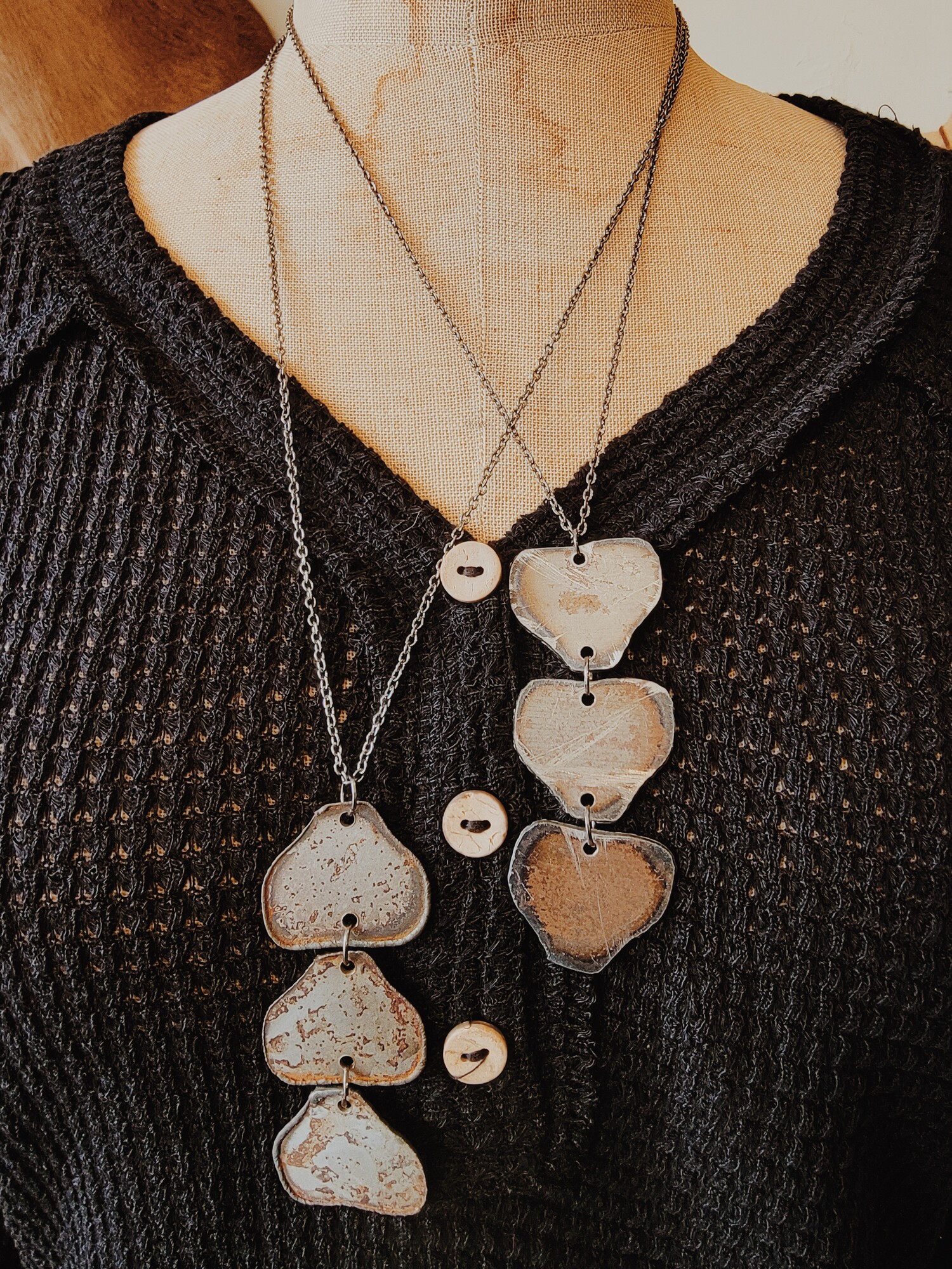 These adorable heart shaped necklaces are available in two chain lengths: 22 inch or 26 inch