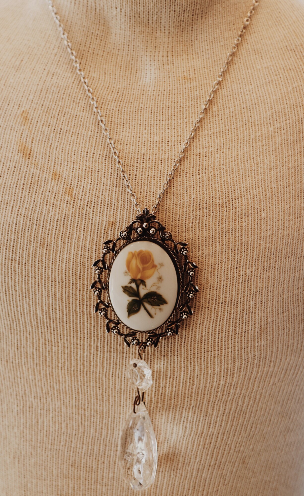 This necklace from Kelli Hawk Designs was handmade from vintage pieces! The vintage pendant measures 4.5 inches long, and the necklace is on a 19 inch chain.