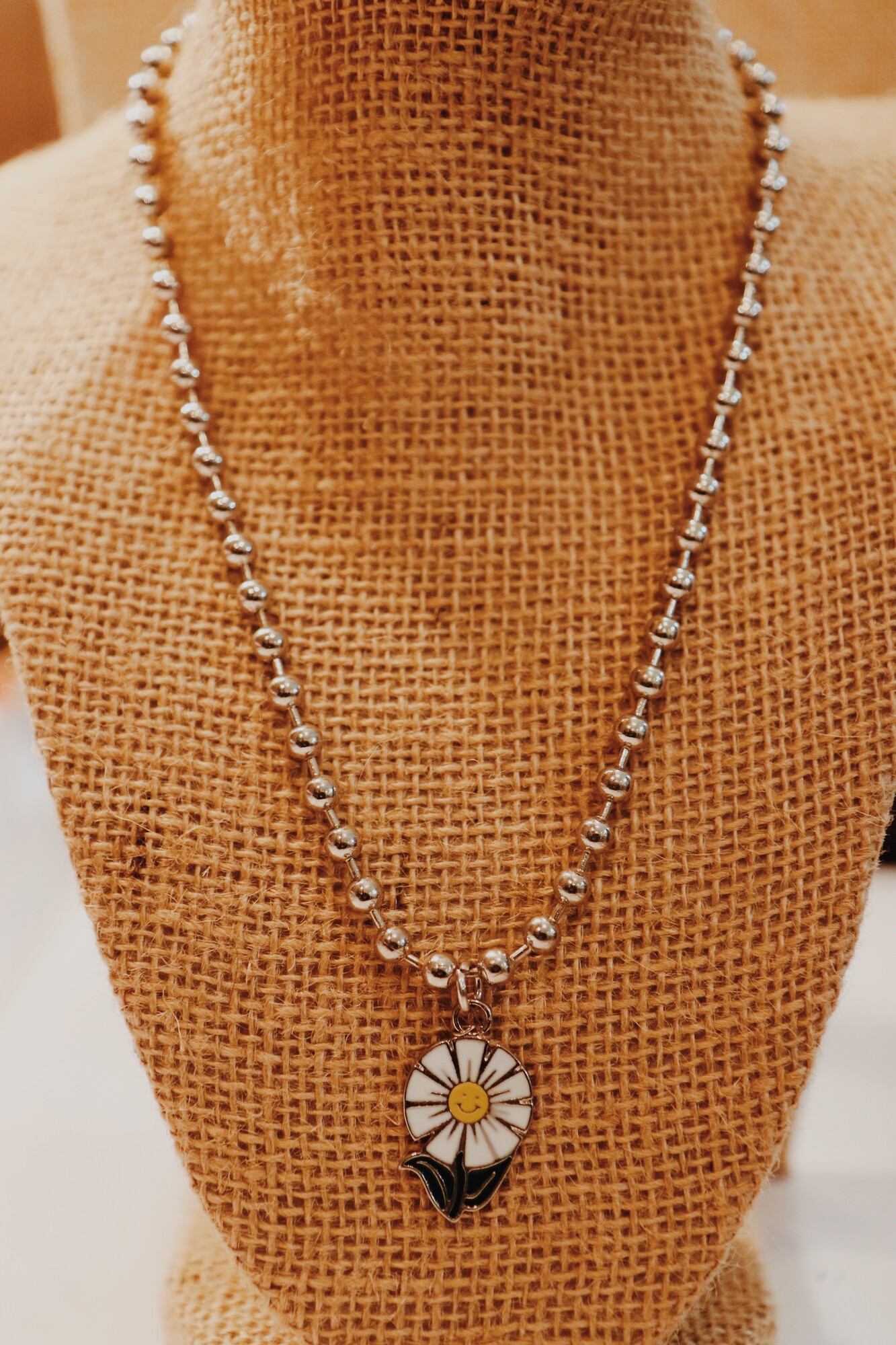 These adorable daisy necklaces by Kelli Hawk Designs are on an 18 inch chian!