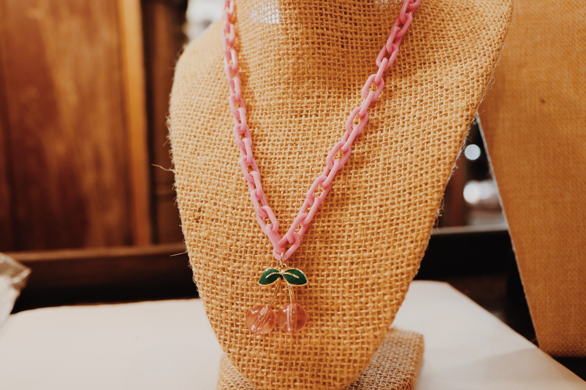 This fun necklace is on a 16 inch hot pink chain with a 2.5 inch extender!