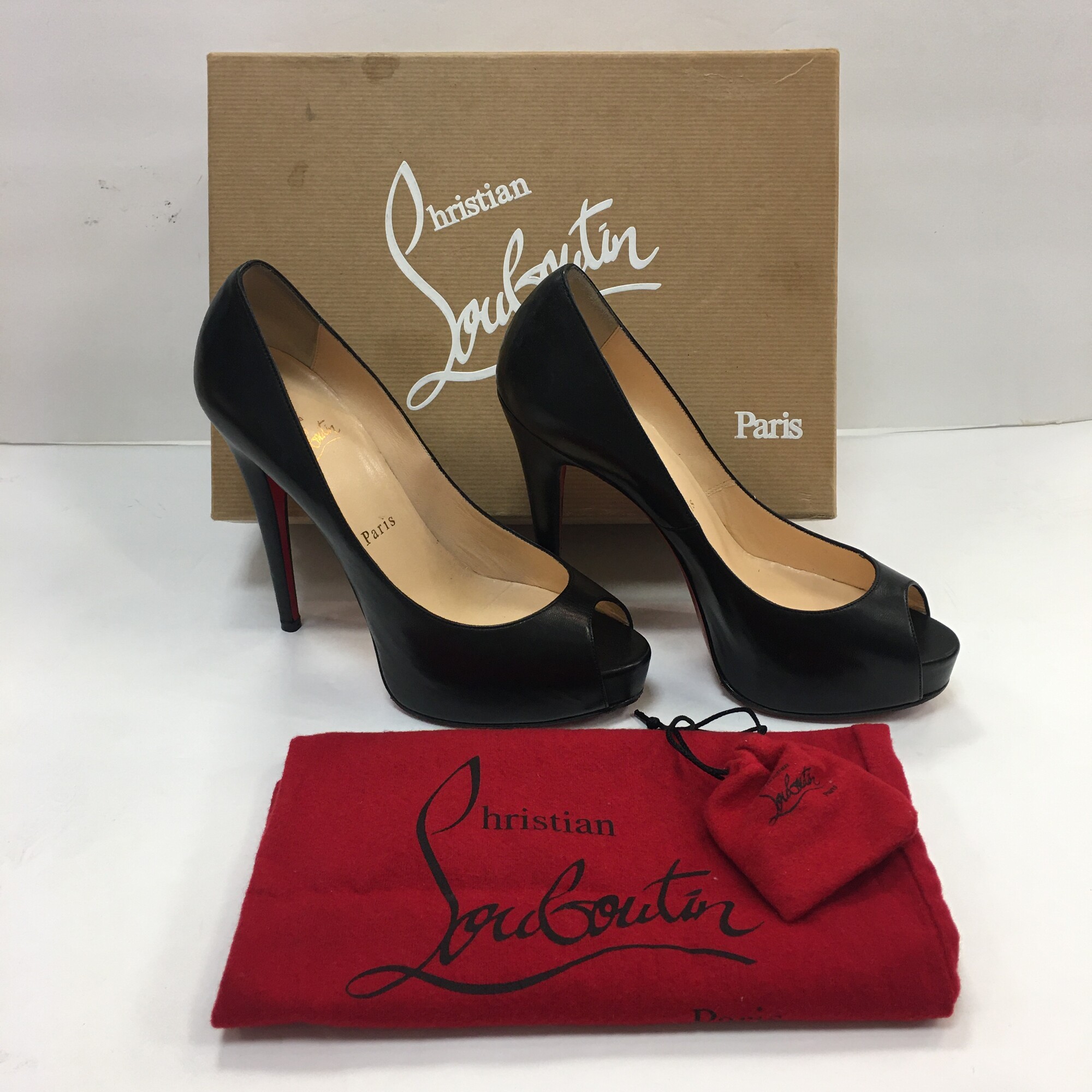 Christian Louboutin Platform open toe pumps.
Size 37 (equivalent to a size 7)
As Is condition: some scuffing throughout the outside of the shoes. Wear on the sole portion and slight wear on the interior (mostly near the toe portion). Please refer to photos.
If you need additional information or photos, please contact the store!