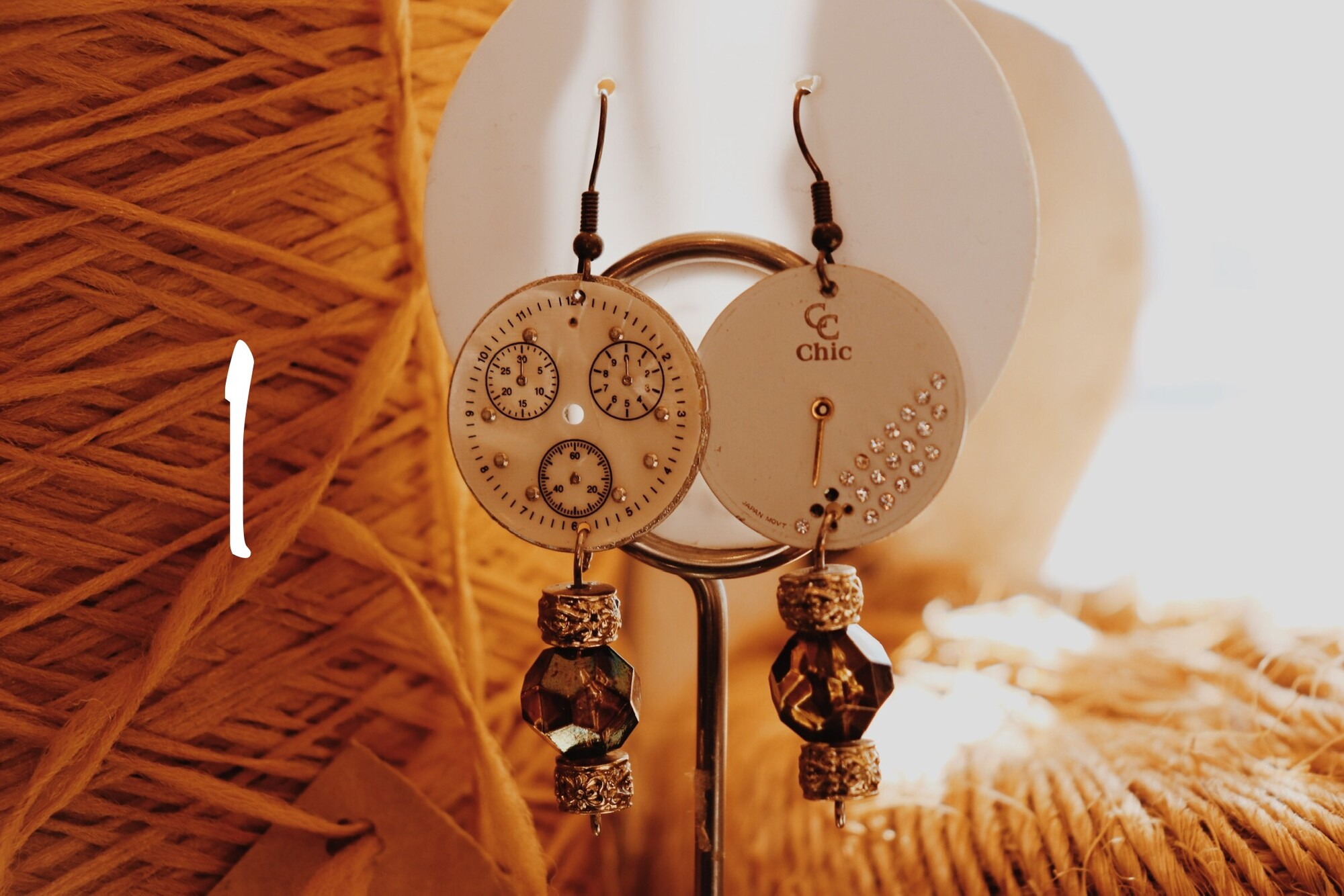 These handmade earrings made from watch faces are so unique! Select the number that matches your preferred earrings.