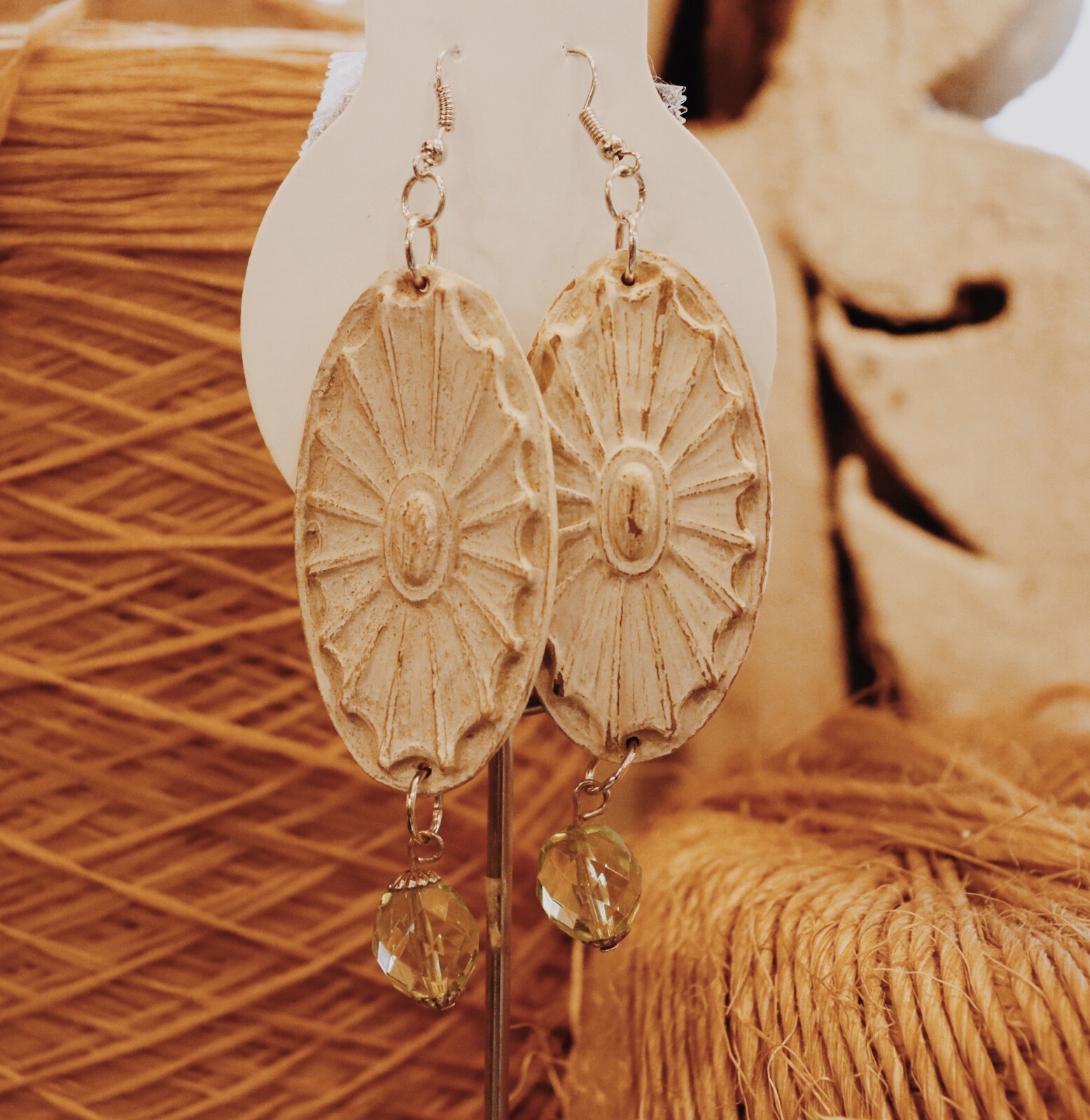 These handmade wooden earrings measure about 3.75 inches long. Please select the color bead you would like.