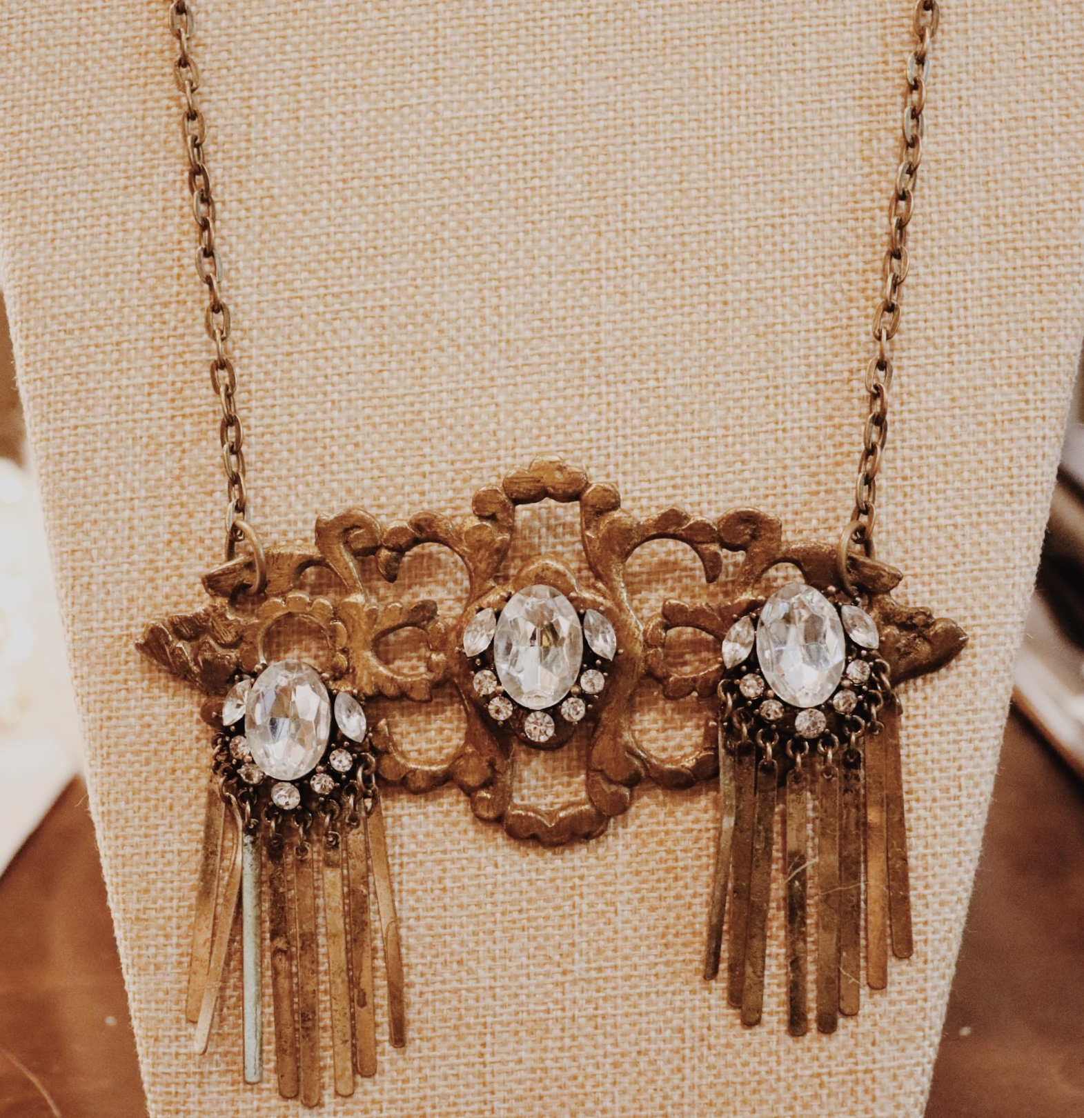This fabulous handmade necklace is on a 22 inch chain and has a vintage handle as the centerpiece!