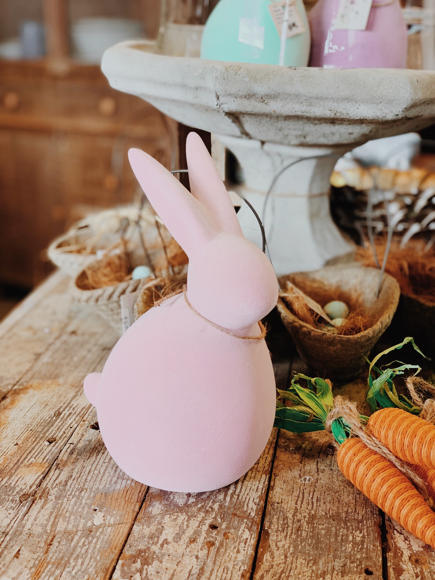 These adorable velveteen easter bunnies are perfect for spring decor! They measure 9 inches tall by 5 inches wide and are available in green, pink, or purple!
