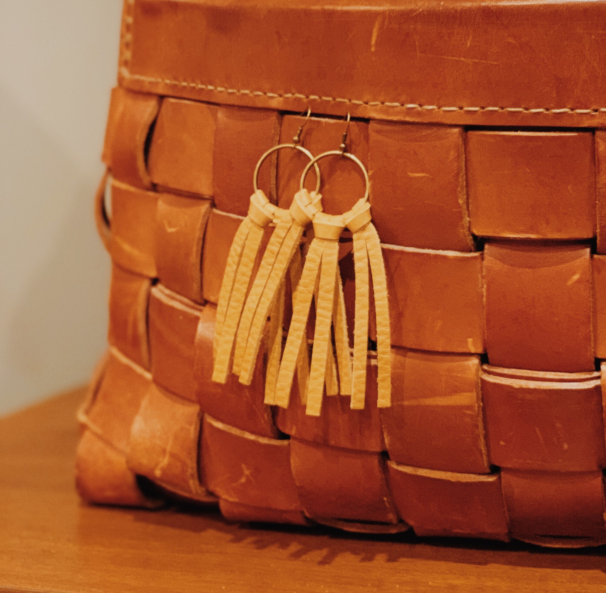 These genuine leather earrings from The Olive Branch were carefully designed and hand crafted! They measure 4.5 inches long.