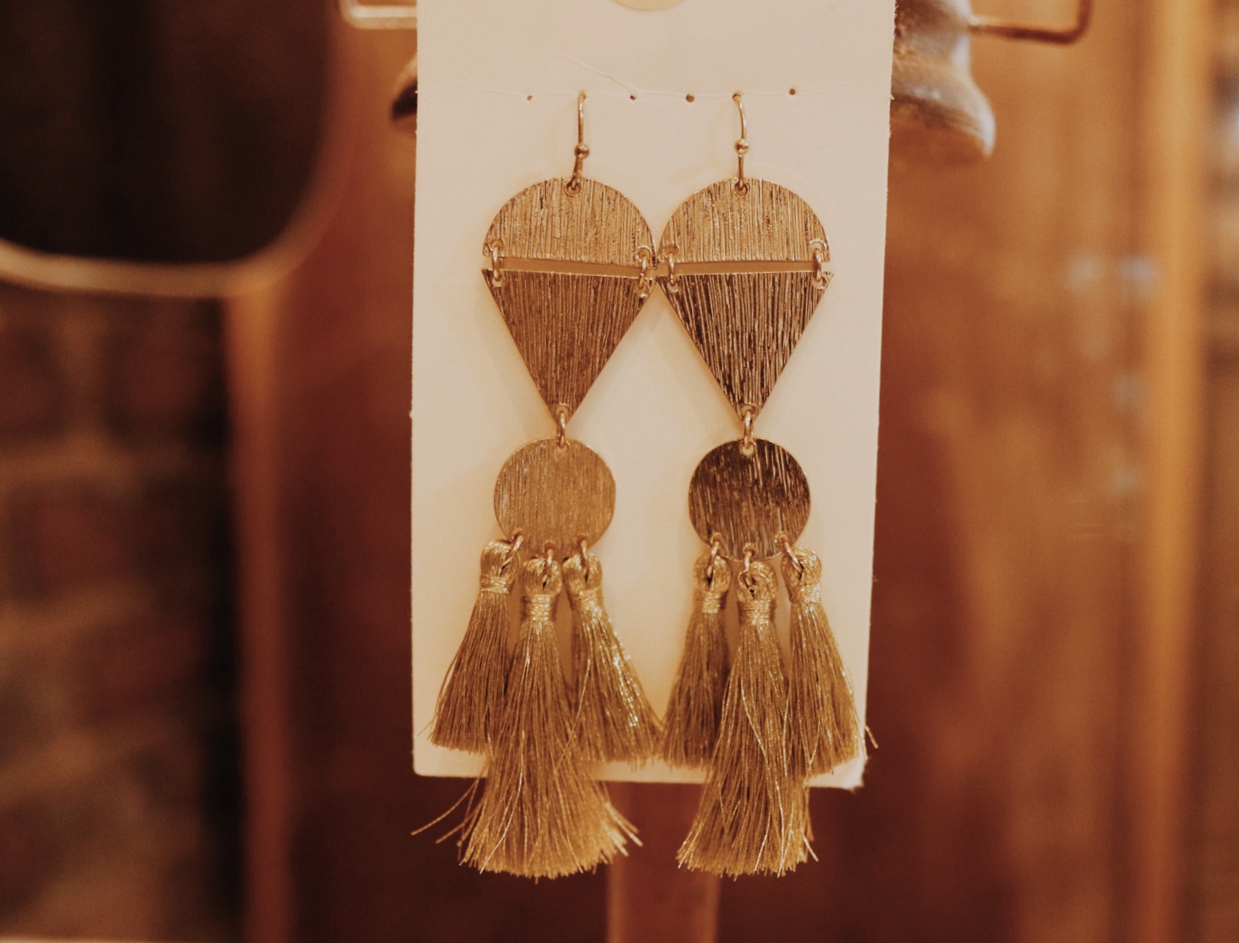 Beautiful gold tassel earrings! Lightweight and 4 inches long!