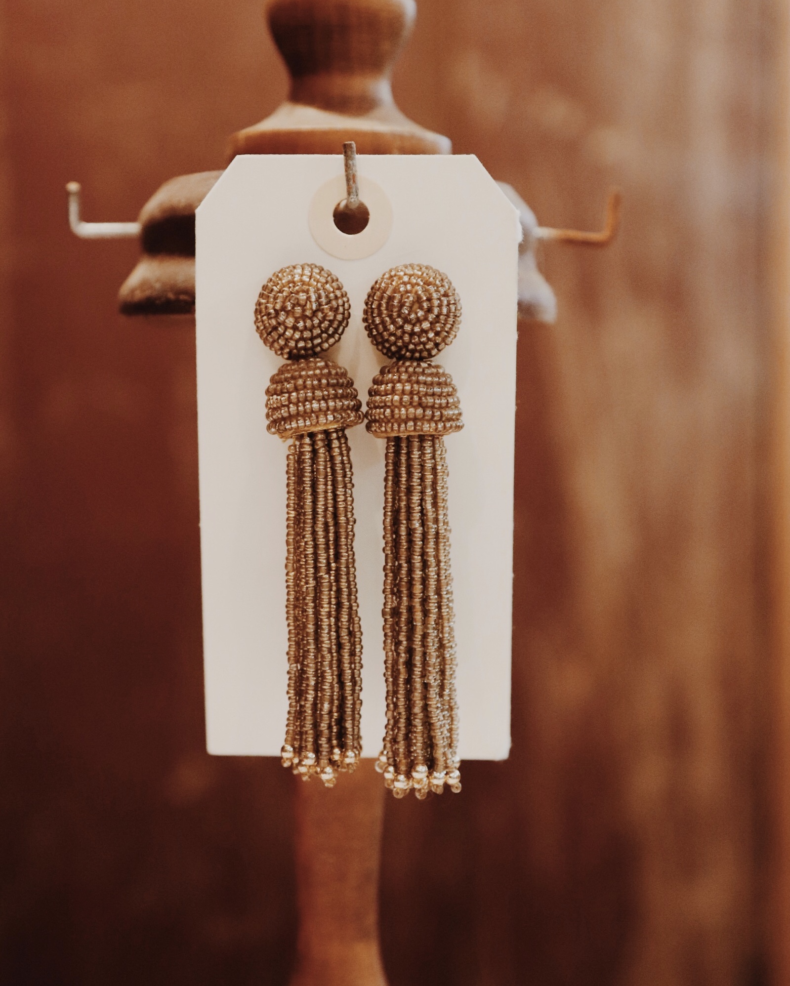 Beautiful gold beaded earrings! Gold toned and 3.75 inches long.