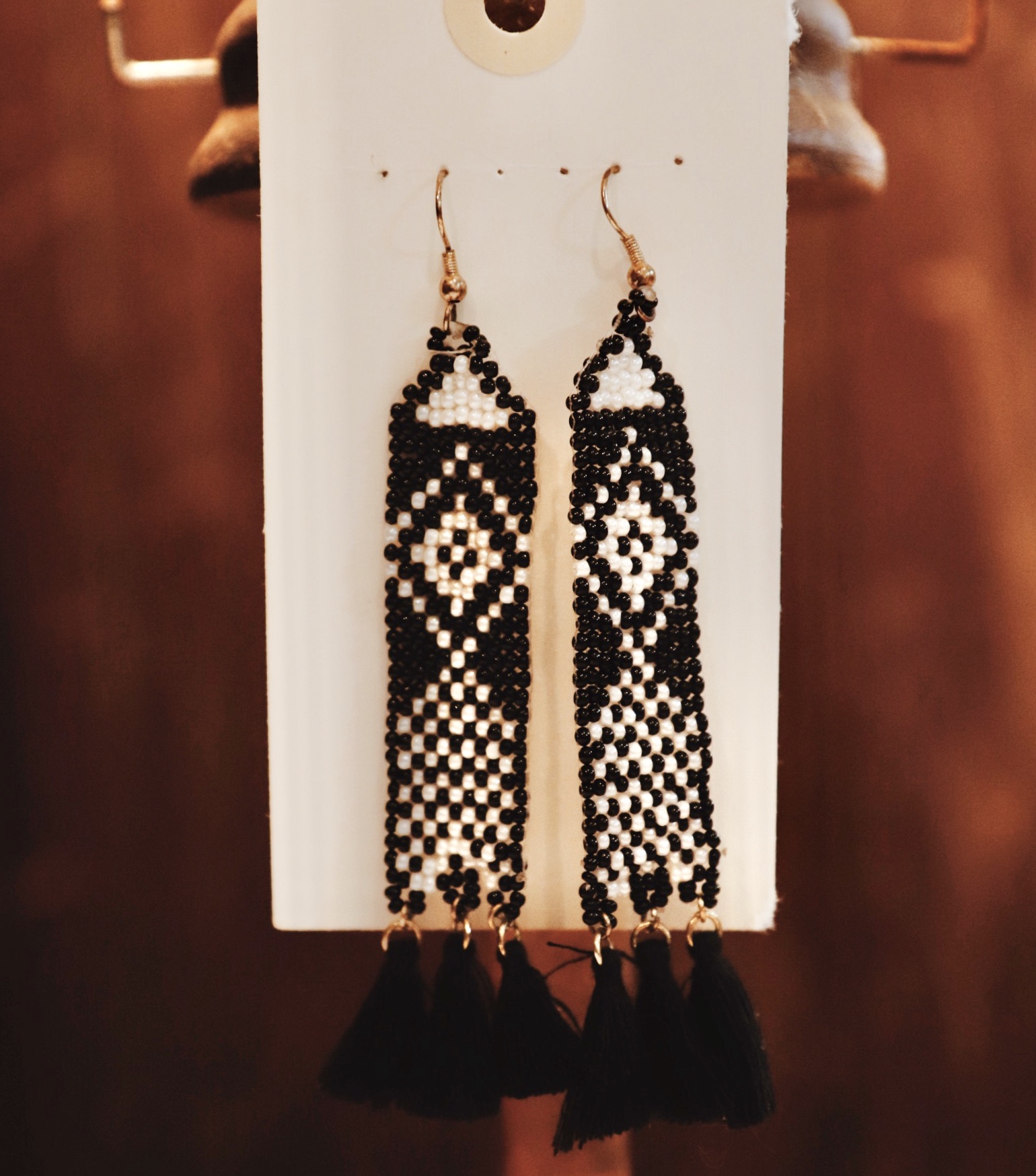 Boho black white beaded aztec earrings! 4 inches long.
