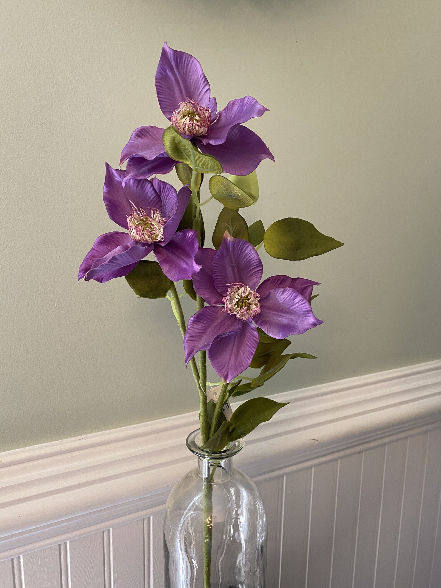 These lovely clematis stems measure 21 inches long and are made completely of fabrics to achieve a natural, real looking floral! The rich purple is such a beautiful pop of color for any space that needs brightening!