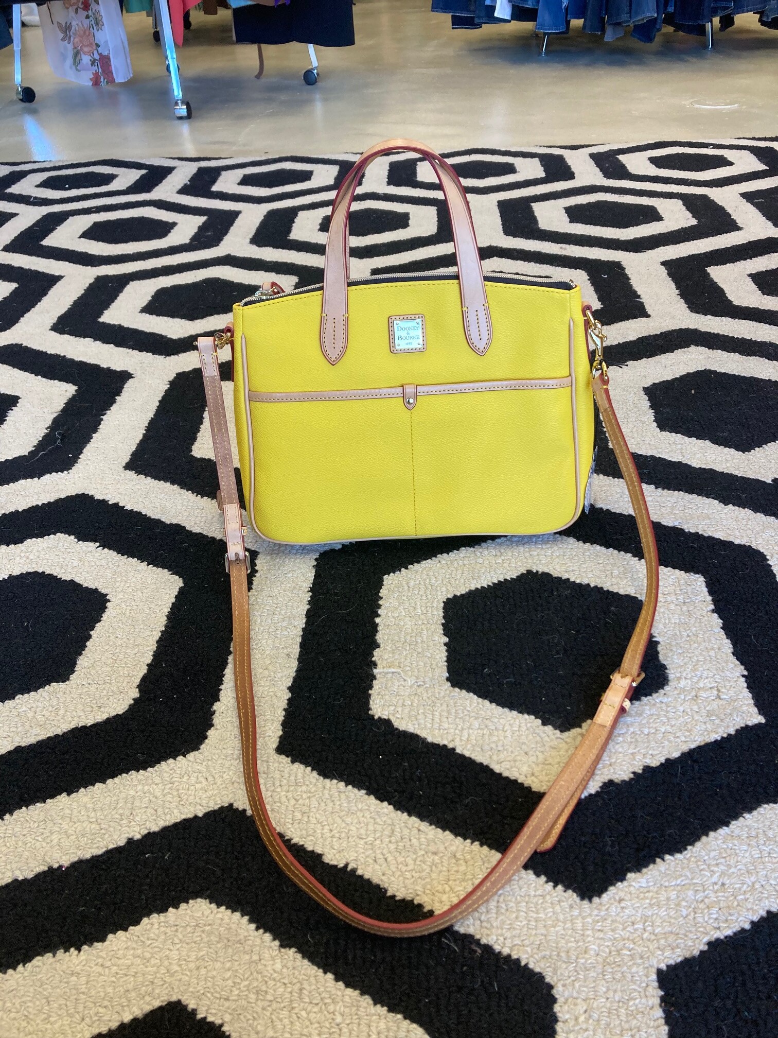 Dooney & Bourke Purse: Add some sunshine to your style with this Dooney & Bourke! Never been carried.  Medium size with crossbody strap.