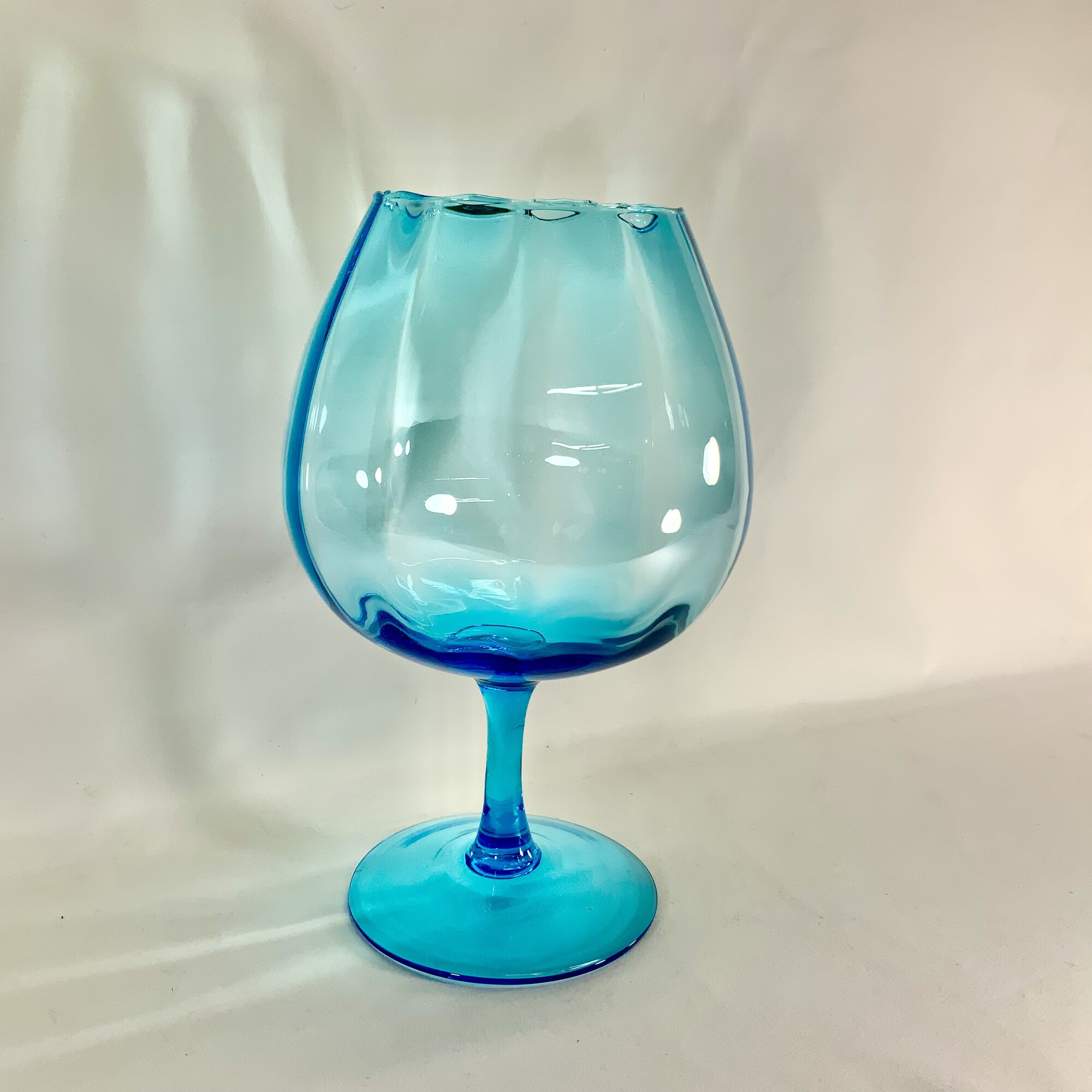 Retro clear blue glass vase. Approximately 11 inches H.