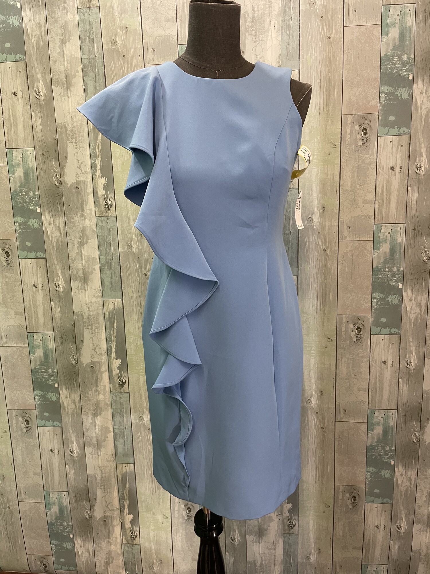 NEW Roz & Ali Dress
Polyester and spandex blend
Retail: $54.00
Blue
Size: 2